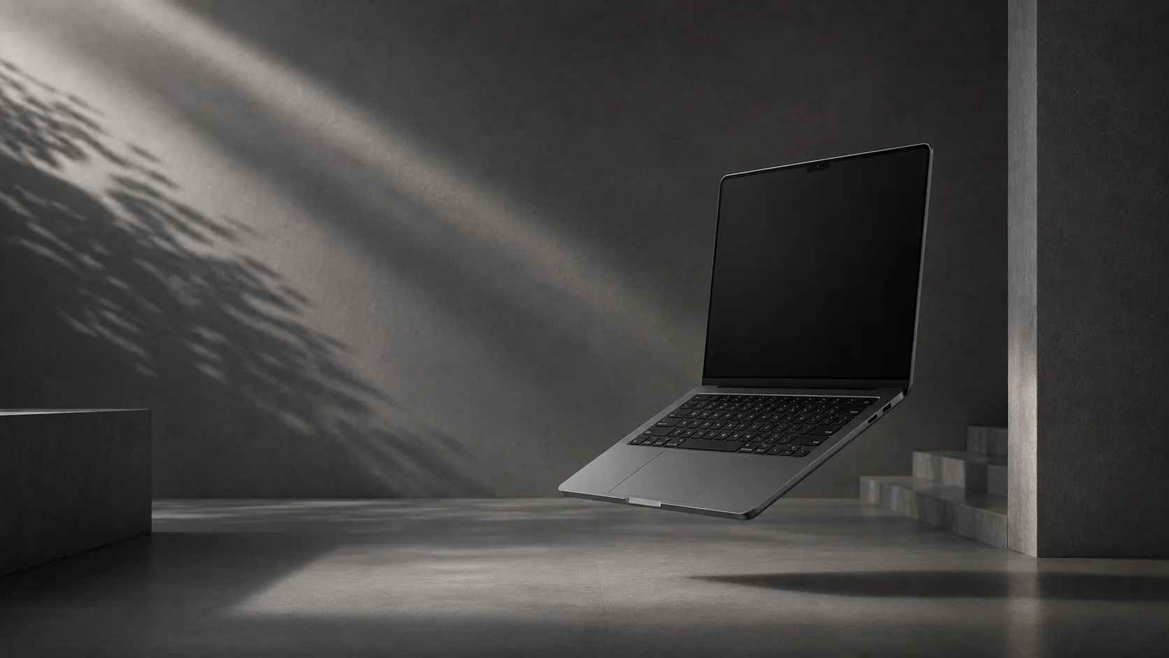 A laptop open in soft morning light